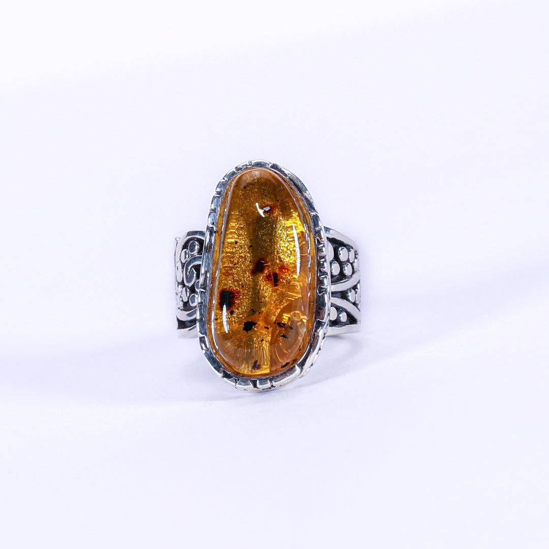 Amber and silver ring - Ornementale