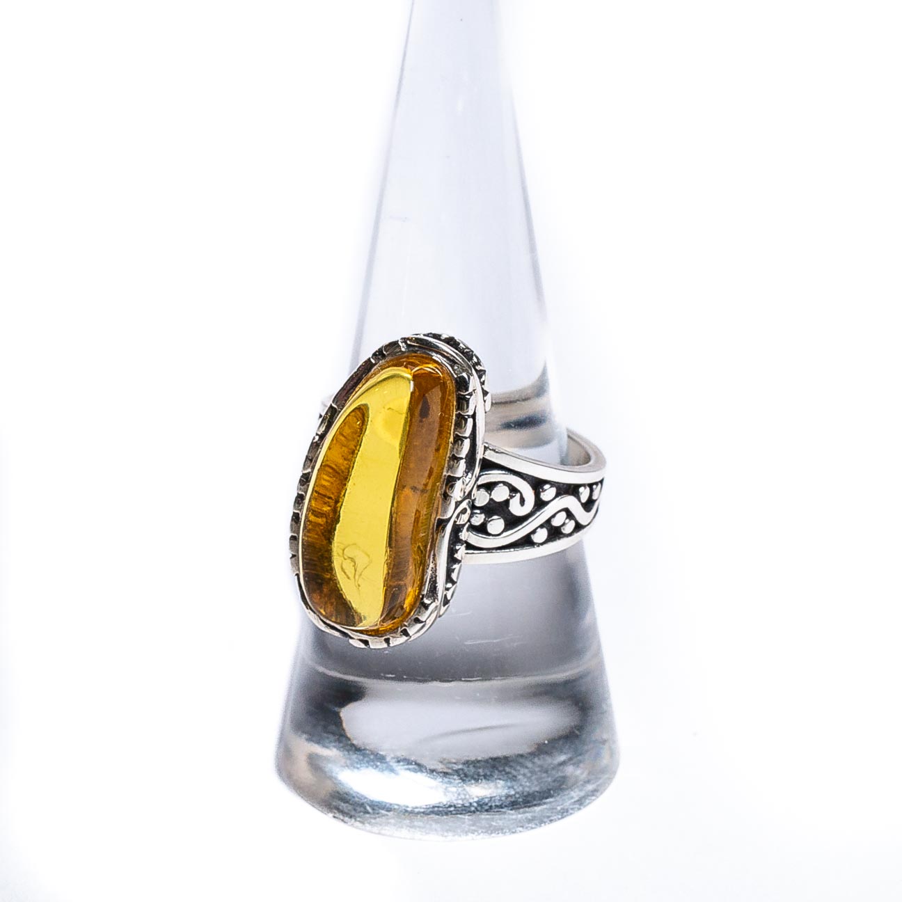 Silver and yellow amber ring - twist